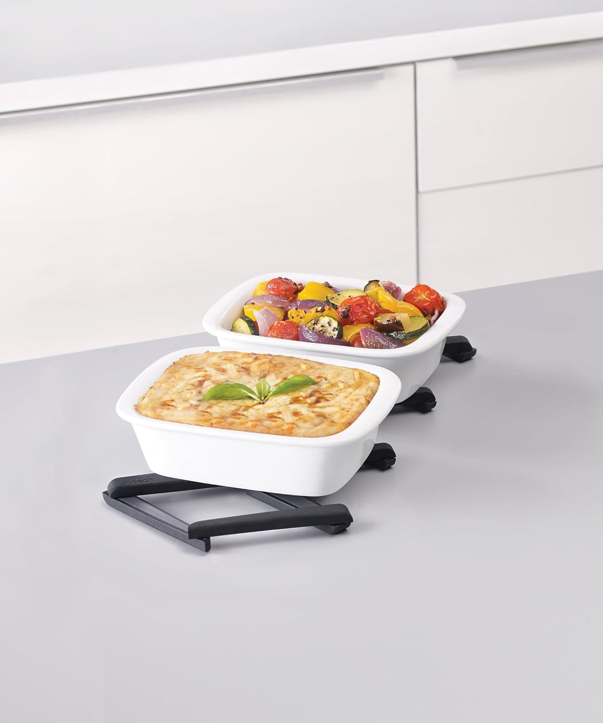 Stretch Folding Silicone Trivet for Hot Pots and Pans, Expanding Nonslip Stand, Heat Resistant mat for Kitchen Worktop - Black