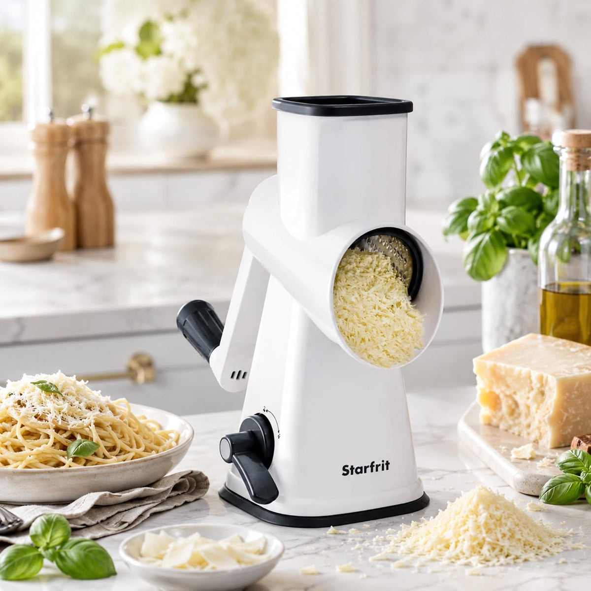 Rotary Drum Grater, 4 Stainless Steel Drums, Slicer & Grater | 4 stainless steel drums. Slice, grate and shave ice. Easy hand crank. Strong suction base. Easy to clean.