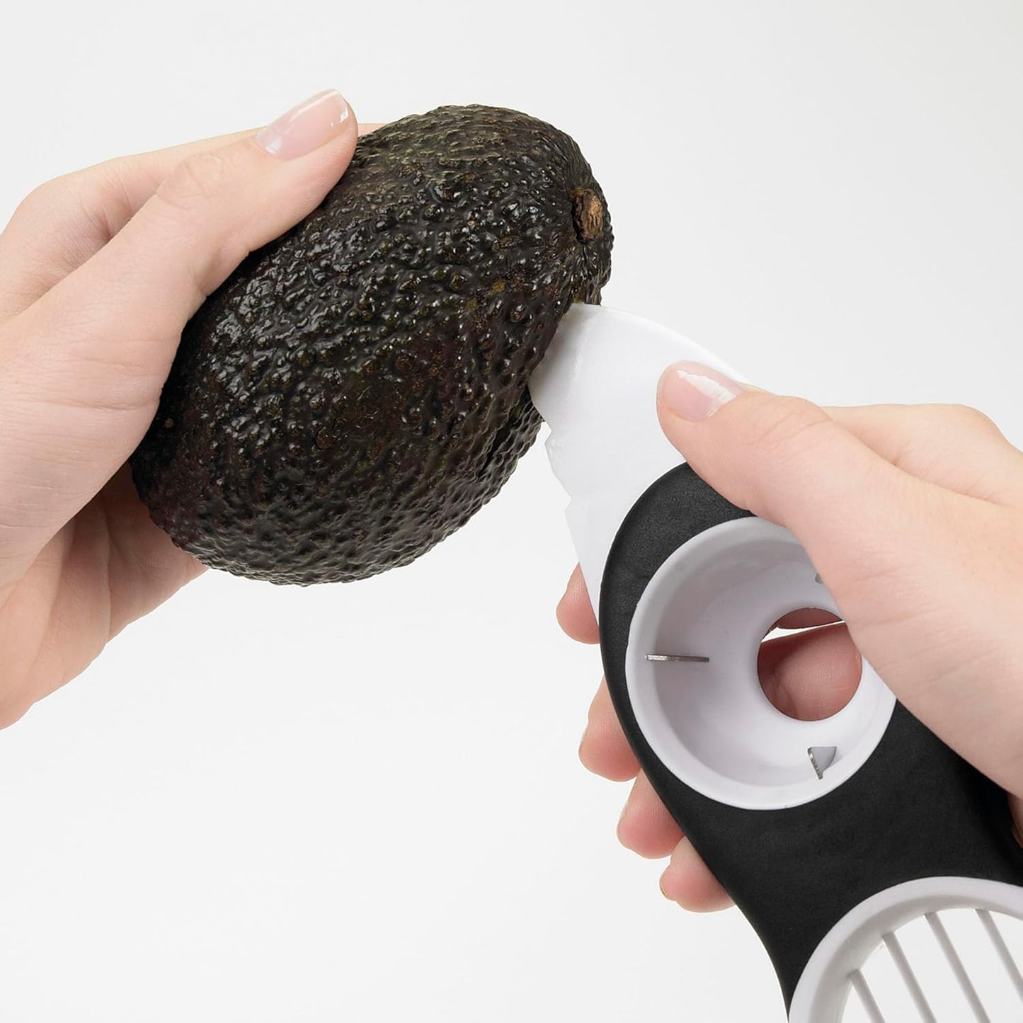 Good Grips 3-in-1 Avocado Slicer, White | Removes pits cleanly and slices effortlessly to speed up food prep, perfect for high-volume commercial catering kitchens.