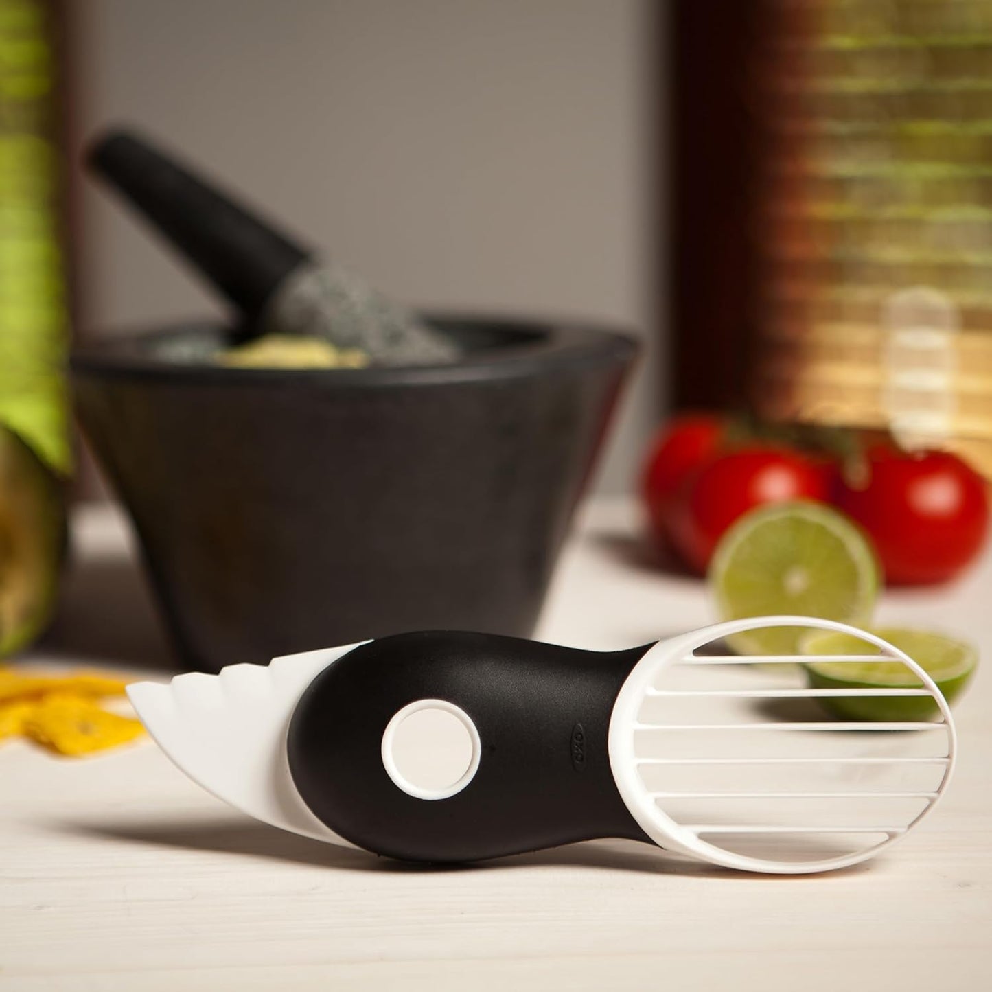 Good Grips 3-in-1 Avocado Slicer, White | Removes pits cleanly and slices effortlessly to speed up food prep, perfect for high-volume commercial catering kitchens.