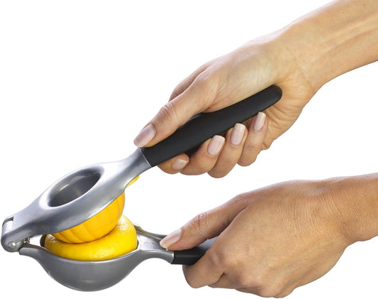 Lemon and lime hand juicer with perfect fit inserts