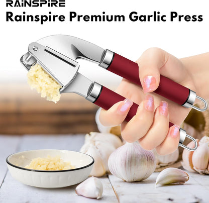 Premium Garlic Press Stainless Steel, Garlic Mincer Tool, Garlic Crusher Tool, Garlic Smasher Garlic Masher Includes Silicone Garlic Peeler & Cleaning Brush, Dishwasher Safe (Red)