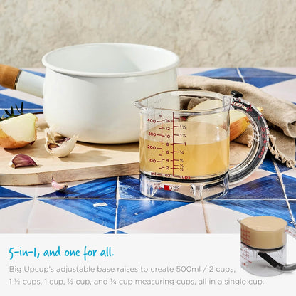 Upcup All-in-1 Adjustable Measuring Cup, Metric & Imperial Measurements up to 1 Cup - Black/Clear | Measures dry and liquid ingredients and scrapes itself clean, easy-to-read metric and imperial measurements, microwave safe