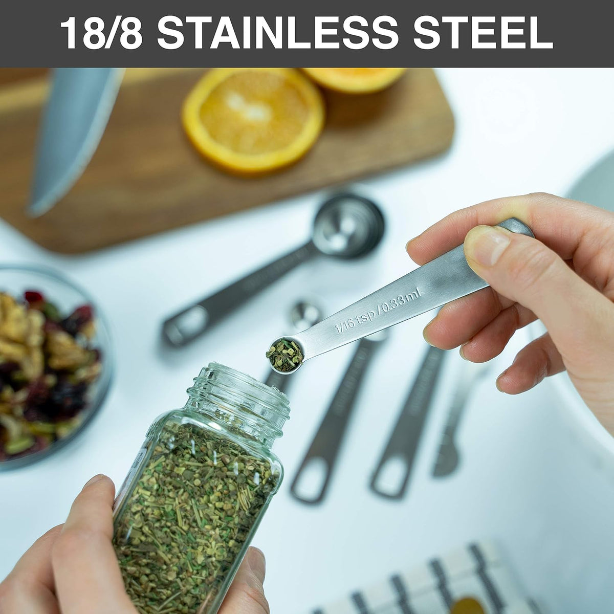 Stainless Steel Measuring Spoons - Set of 9 + Leveler | Heavy duty 18/8 stainless steel measuring spoon set with US & metric measurements for dry and liquid ingredients.