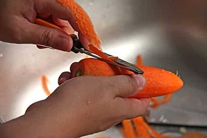 Vegetable left handed peeler
