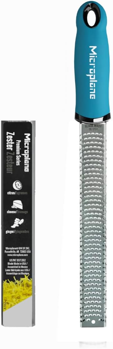 Premium Classic Series Zester - Pomegranate Red | Lemon Zester tool, Hard Cheese & Vegetable Grater | For Citrus, Parmesan Cheese, Garlic, Ginger, Nutmeg | Fine Stainless Steel Blade, Made in USA