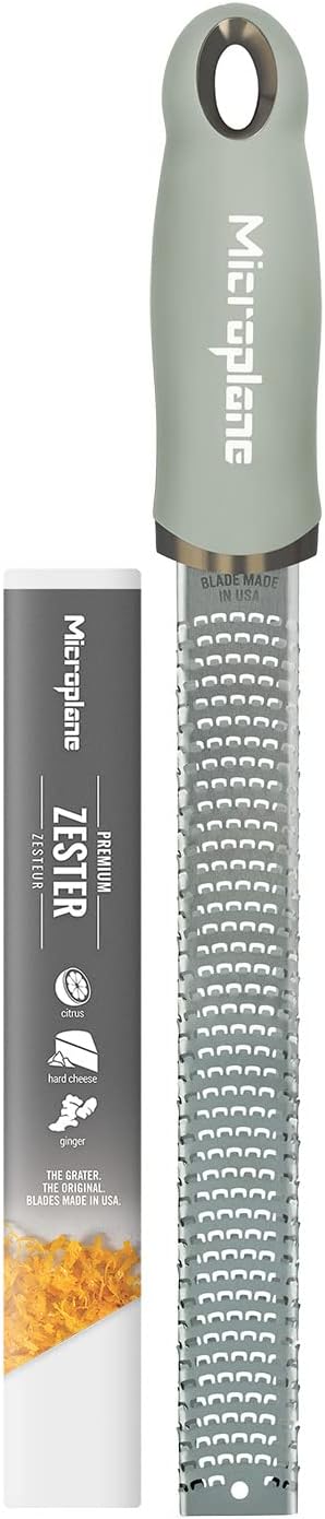 Premium Classic Series Zester - Pomegranate Red | Lemon Zester tool, Hard Cheese & Vegetable Grater | For Citrus, Parmesan Cheese, Garlic, Ginger, Nutmeg | Fine Stainless Steel Blade, Made in USA