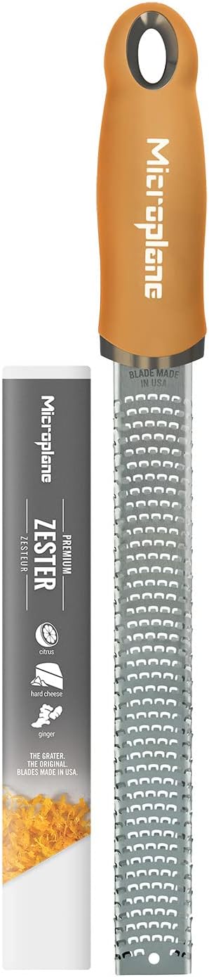 Premium Classic Series Zester - Pomegranate Red | Lemon Zester tool, Hard Cheese & Vegetable Grater | For Citrus, Parmesan Cheese, Garlic, Ginger, Nutmeg | Fine Stainless Steel Blade, Made in USA