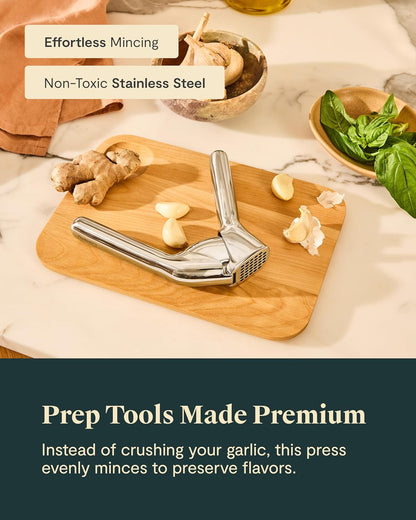 Garlic Press - Non Toxic Stainless Steel - Essential Kitchen Tool - Ergonomic Handle - Effortlessly Mince Whole Garlic - Easy Clean
