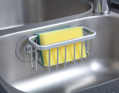 NeverRust Kitchen & Bathroom Sink Caddy for Sponges, Scrubbers, Soap, 6" x 2.5" x 2.65", with Adhesive Mount - Additional Suction Cup Included –Aluminum (Black)