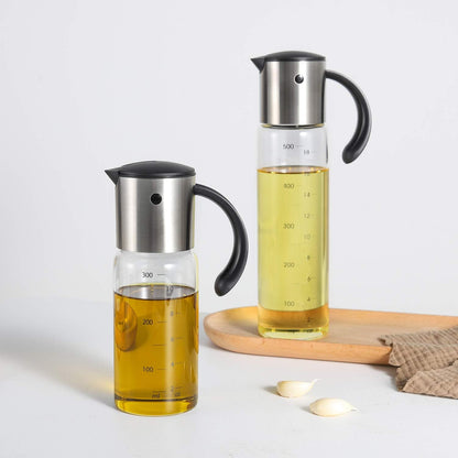 Vucchini Large Olive Oil Dispenser Bottle 17 oz - Auto Flip Condiment Container - Leakproof Vinegar Dispenser Glass Cruet Stainless Steel