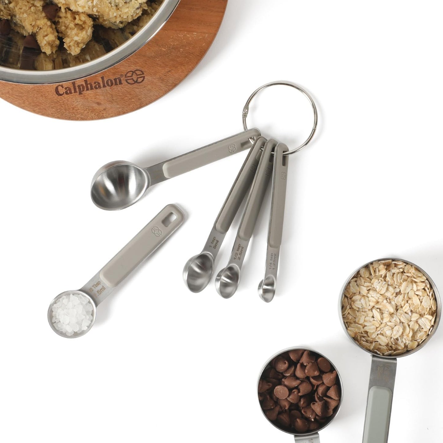 Calphalon Prime Measuring Spoons, Plastic Measuring Spoon Set, 5-Piece Stainless Steel Measuring Spoons Navy Silicone Handle Accurate, Durable for Spices and Small Portions
