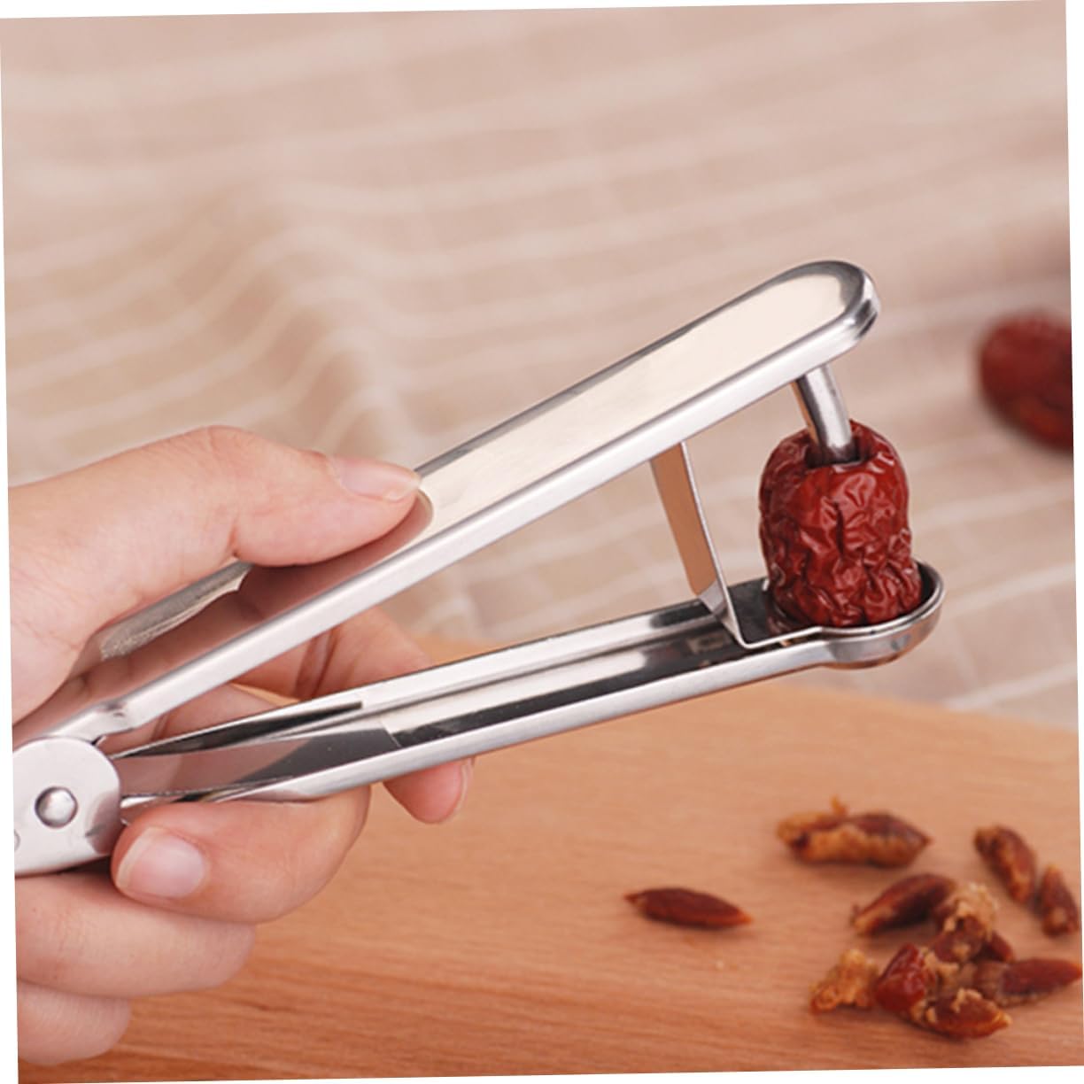 SHOWERORO Stainless Steel Date Pit Remover and Cherry Pitter Tool for Quick Fruit Core Removal Compact 5.70 Inch Kitchen Gadget Ideal for Baking and Cooking