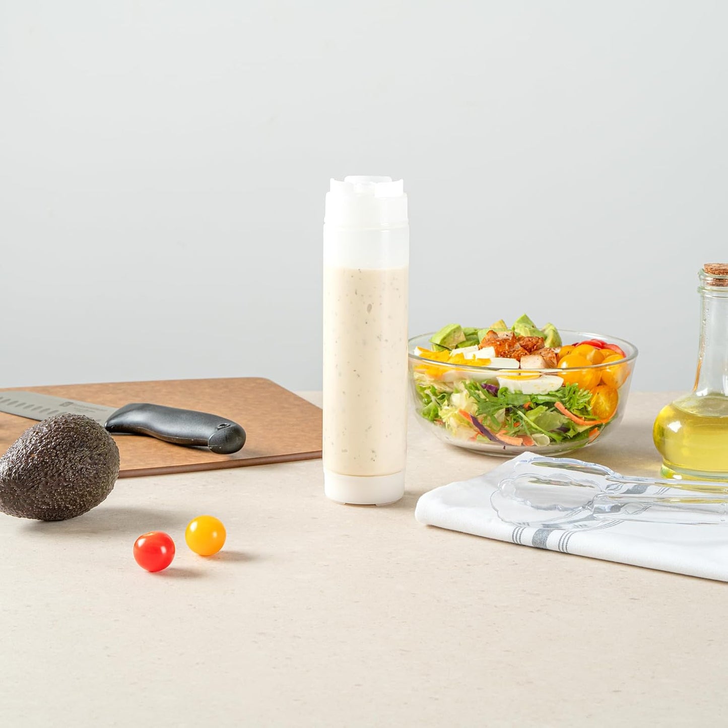Restaurantware Plastic Squeeze Bottle 16 oz Refillable Condiment Bottle Large Valve Dishwashable Clear Inverted Sauce Dispenser For Thick Condiments, Dressings, Batter, Sour Cream, And Syrups