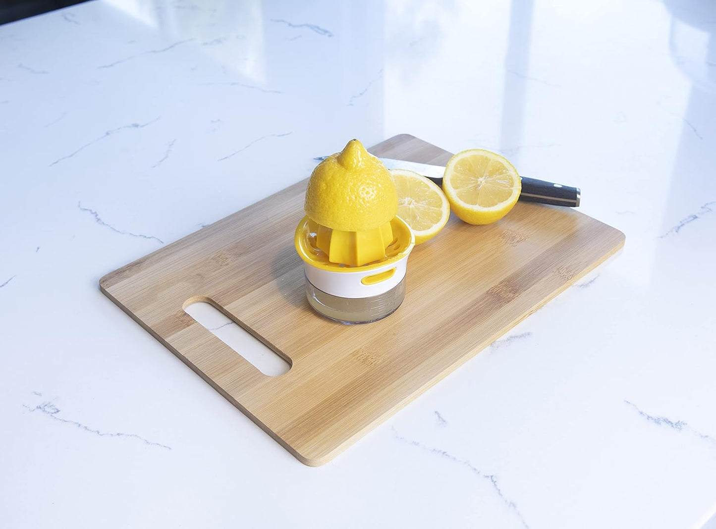 Joie Lemon and Lime Small Hand Juicer and Reamer, Built-In Measuring Cup, 1oz/30ml, Easy to Strain, Stores Leftover Juice, BPA-Free, Dishwasher Safe