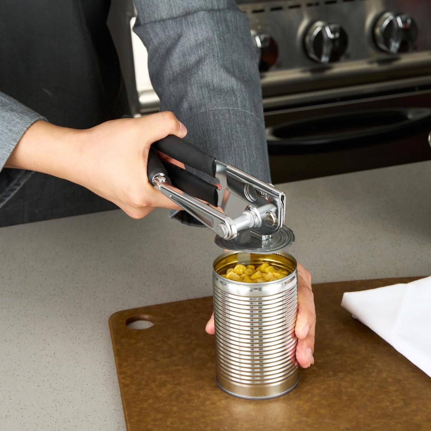 Restaurantware Stainless Steel Magnetic Manual Can Opener - German Standard Red Crank Can Opener with Magnet, Ergonomic Handles, Non-Slip - Heavy-Duty Hand Can Opener, Easy Turn, Sharp Blade