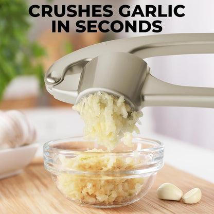 Zulay Kitchen Premium Garlic Press Set - Rust Proof Professional Garlic Mincer Tool - Easy-Squeeze, Easy-Clean with Soft, Ergonomic Handle - Silicone Garlic Peeler & Brush (Silver)