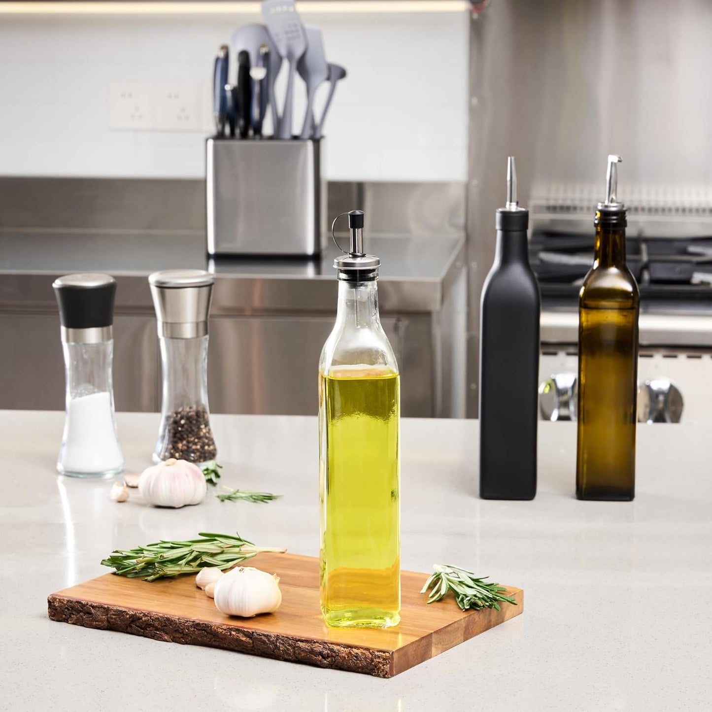 Restaurantware RW Base 16.9 Ounce Olive Oil Dispenser 1 Kitchen Oil Dispenser Bottle - With Stainless Steel Pourer Non-Leaking Black Glass Olive Oil Pourer For Cooking Or Salad Dressings
