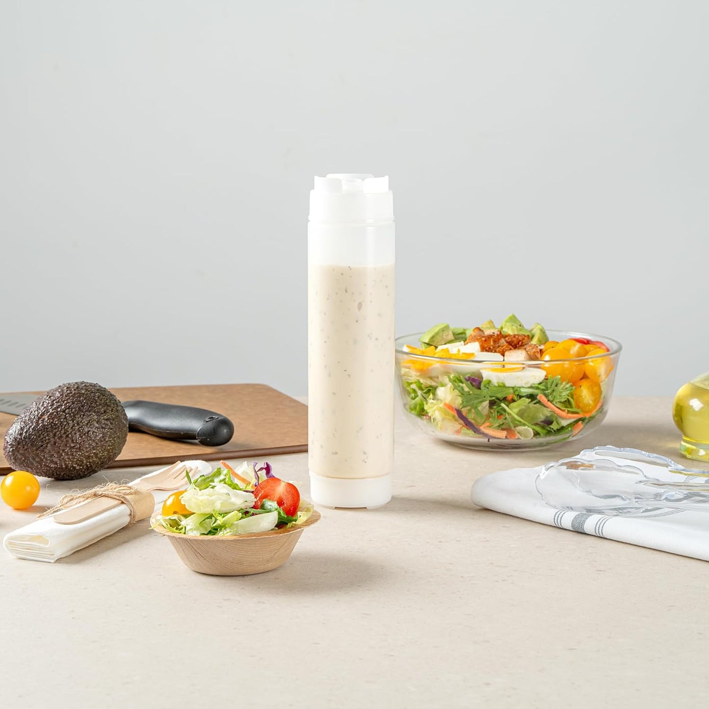 Restaurantware Plastic Squeeze Bottle 16 oz Refillable Condiment Bottle Large Valve Dishwashable Clear Inverted Sauce Dispenser For Thick Condiments, Dressings, Batter, Sour Cream, And Syrups