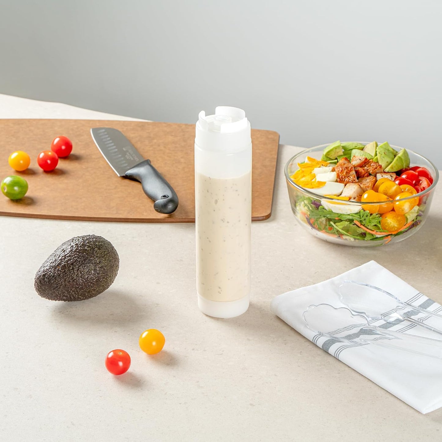 Restaurantware Plastic Squeeze Bottle 16 oz Refillable Condiment Bottle Large Valve Dishwashable Clear Inverted Sauce Dispenser For Thick Condiments, Dressings, Batter, Sour Cream, And Syrups