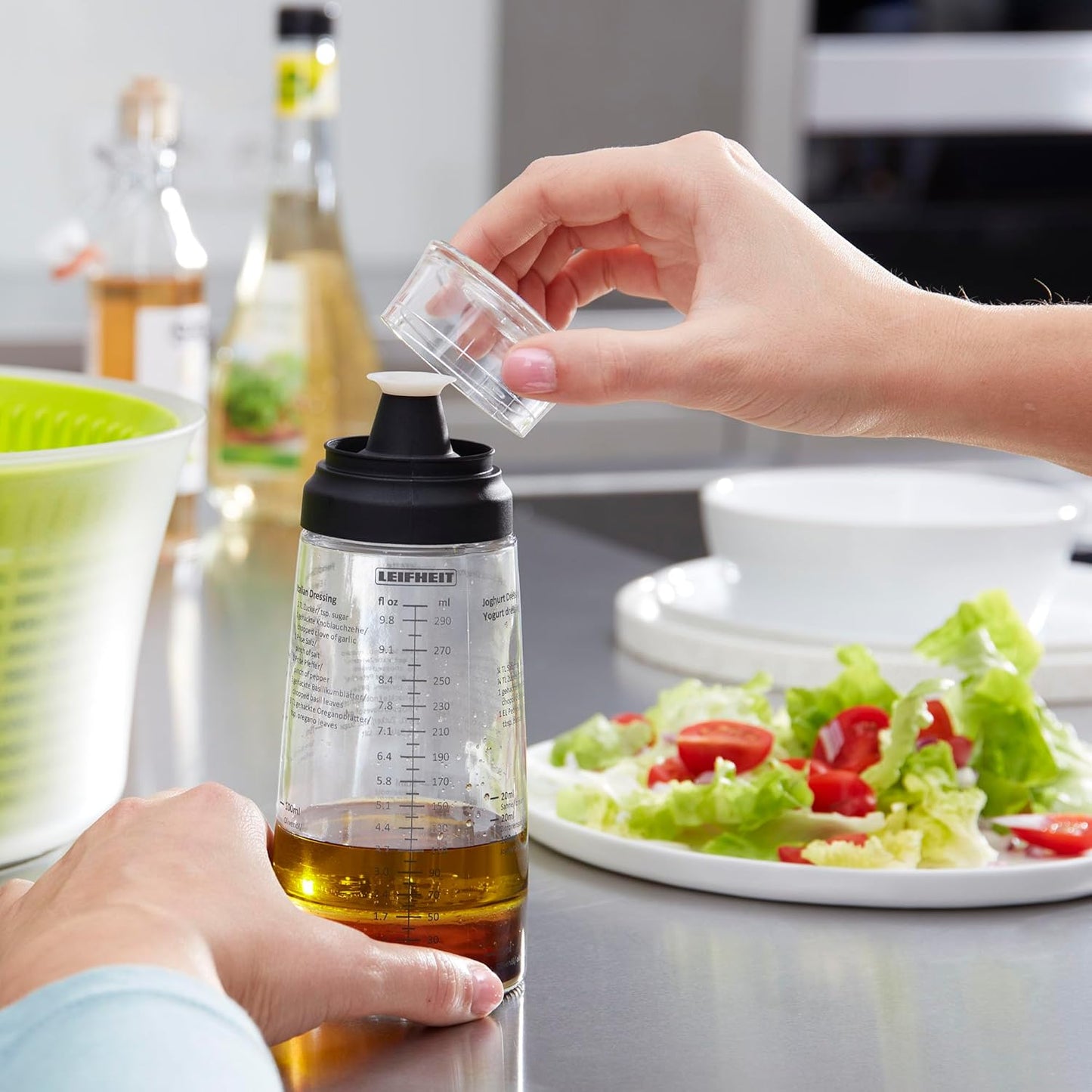 Leifheit Glass Salad Dressing Bottle 10 oz – Durable Eco-Friendly Glass with Leakproof Plastic Lid, Non-Drip Spout, Built-In Recipe Guide, Dishwasher Safe, German Design – Black