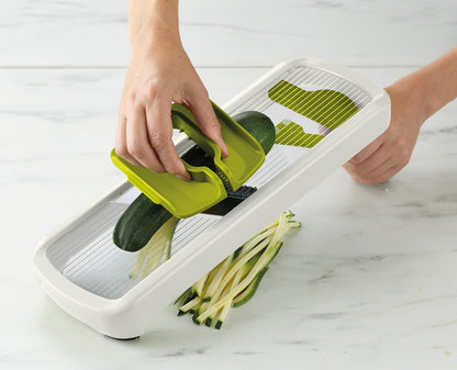 Joseph Joseph Multi-Grip Hand-held Kitchen Mandoline, Fruit and Vegetable Slicer with Food Grip and Adjustable Blades, Dishwasher Safe