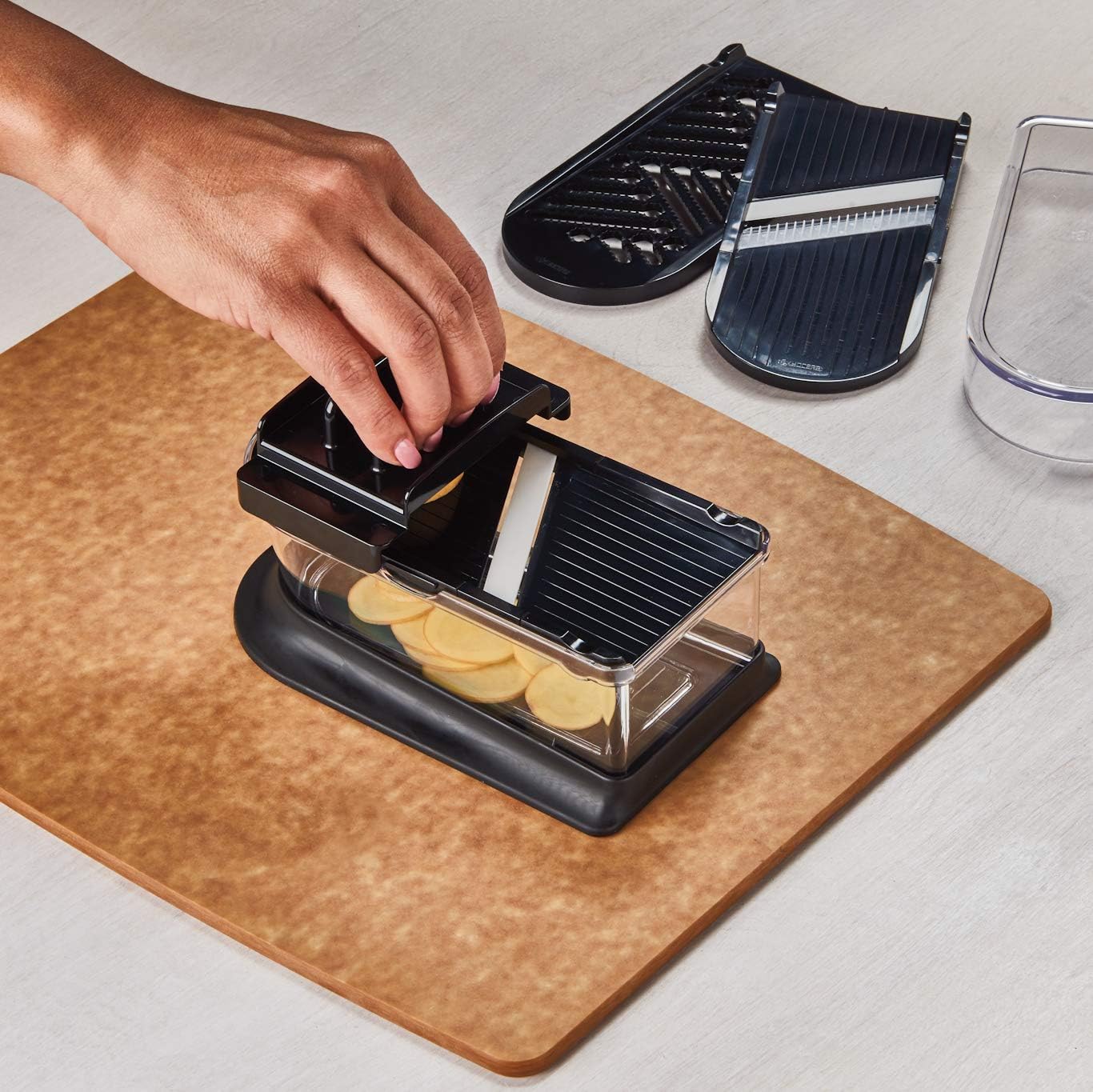 Kyocera Advanced Ceramics 6-Piece Mini Slicer Sets Inludes: Mandoline Slicer; Julienne Slicer; Grater; Storage Container; Handguard