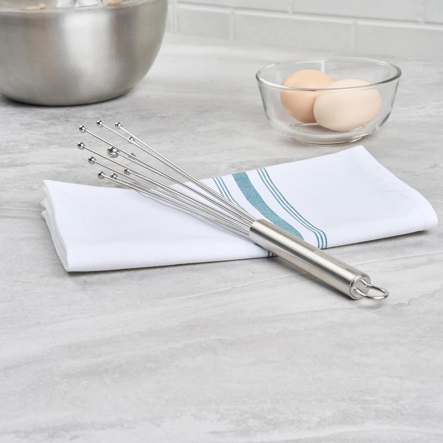 Restaurantware 10.5 in Stainless Steel Ball Whisk - German Standard Egg Beater with Ergonomic Handle, Dishwasher Safe - Manual Mixer Cooking Whisk for Baking, Stirring, Sauces, Beating