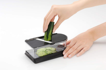 Kyocera Advanced Ceramics 6-Piece Mini Slicer Sets Inludes: Mandoline Slicer; Julienne Slicer; Grater; Storage Container; Handguard
