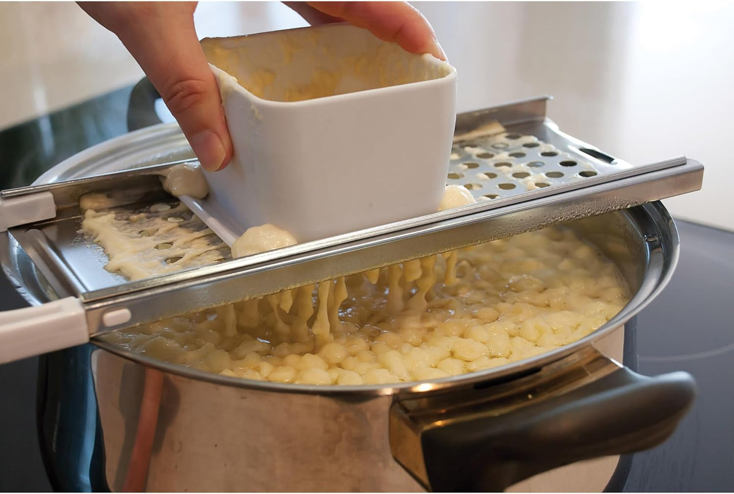 HIC Kitchen Spaetzle Noodle Dumpling Maker Lid with Scraper, Fits up to 10.5-Inch Pots