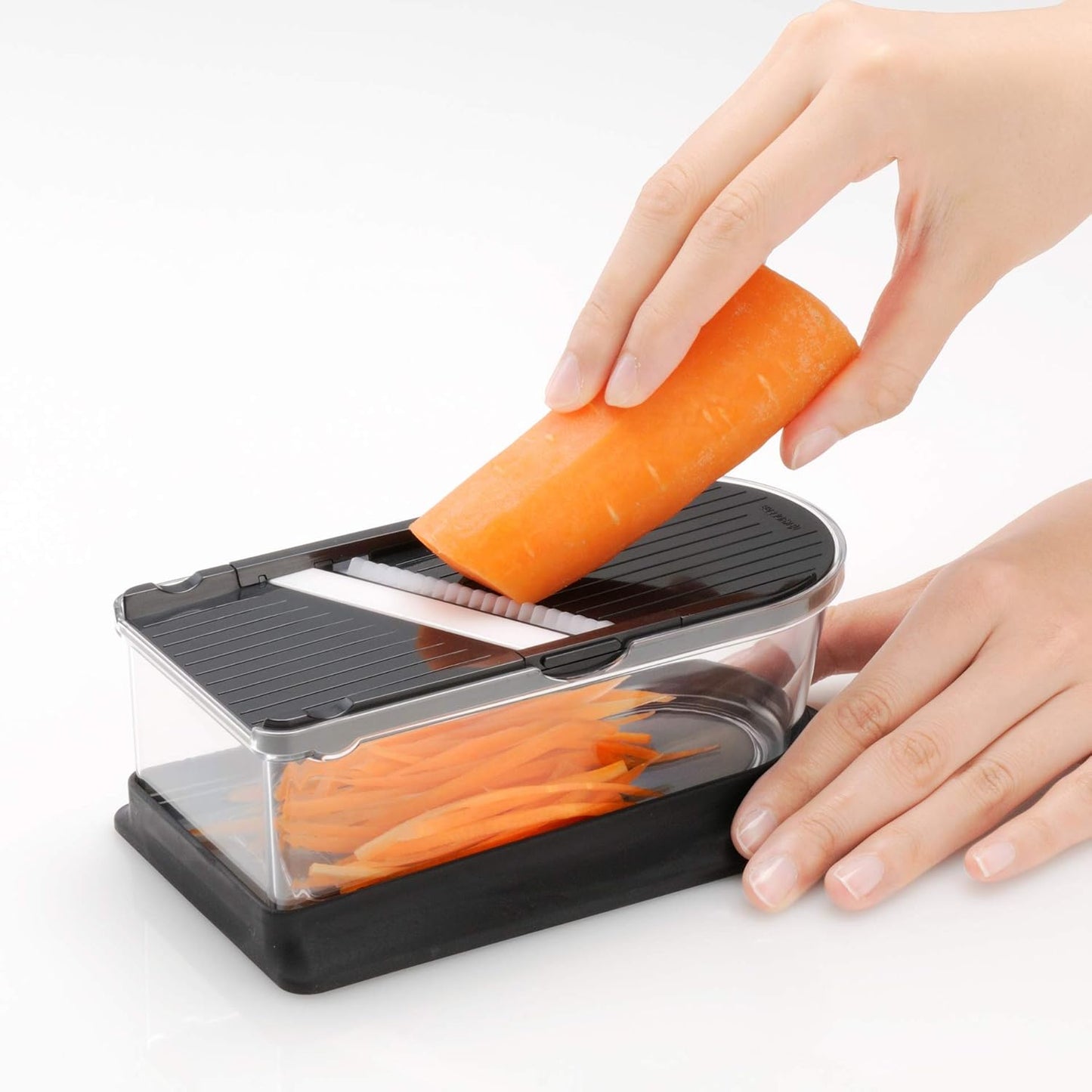 Kyocera Advanced Ceramics 6-Piece Mini Slicer Sets Inludes: Mandoline Slicer; Julienne Slicer; Grater; Storage Container; Handguard
