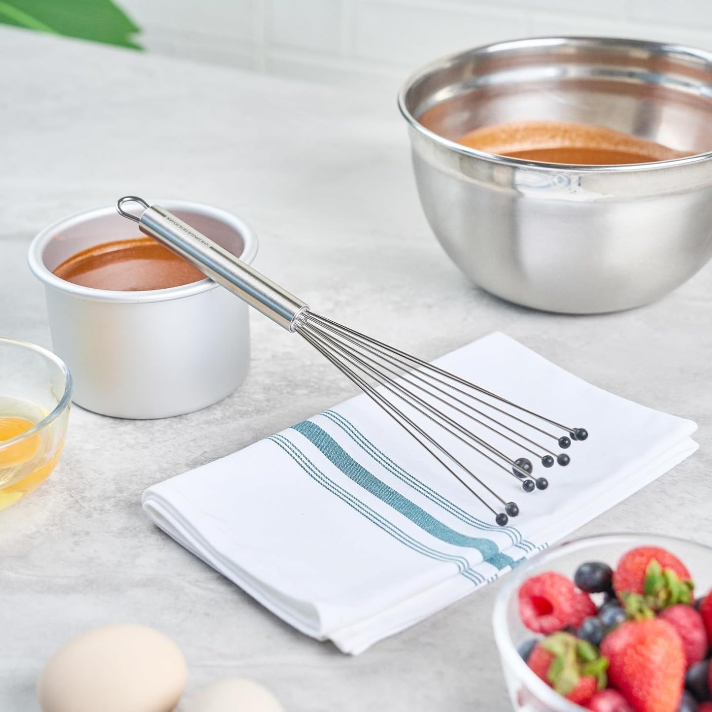 Restaurantware 10.5 in Stainless Steel Ball Whisk - German Standard Egg Beater with Ergonomic Handle, Dishwasher Safe - Manual Mixer Cooking Whisk for Baking, Stirring, Sauces, Beating