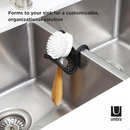 Sling Flexible Sink Caddy, Elastic Non-Slip Sponge Holder, Black | Rubber material, perforated base for drainage, prevents moisture buildup, fits faucet necks, easy rinse clean