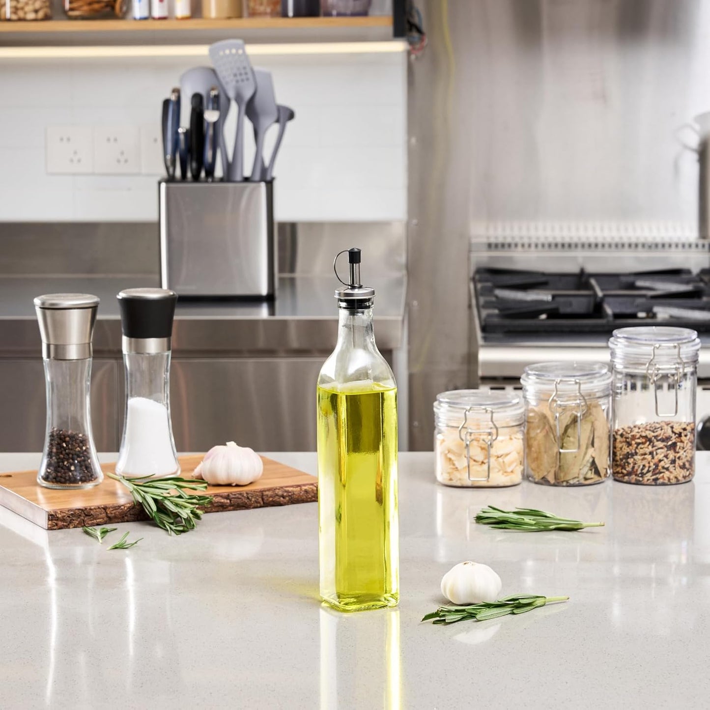 Restaurantware RW Base 16.9 Ounce Olive Oil Dispenser 1 Kitchen Oil Dispenser Bottle - With Stainless Steel Pourer Non-Leaking Black Glass Olive Oil Pourer For Cooking Or Salad Dressings