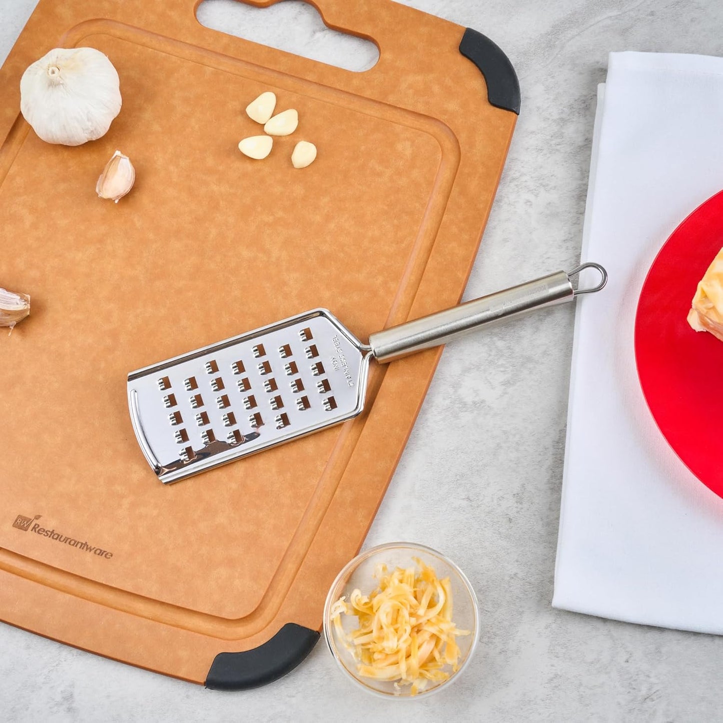 Restaurantware Stainless Steel Coarse Cheese Grater - German Standard Lemon Zester with Ergonomic Handle, Sharp Blades, Dishwasher Safe - Handheld Kitchen Grater for Parmesan, Garlic, Ginger