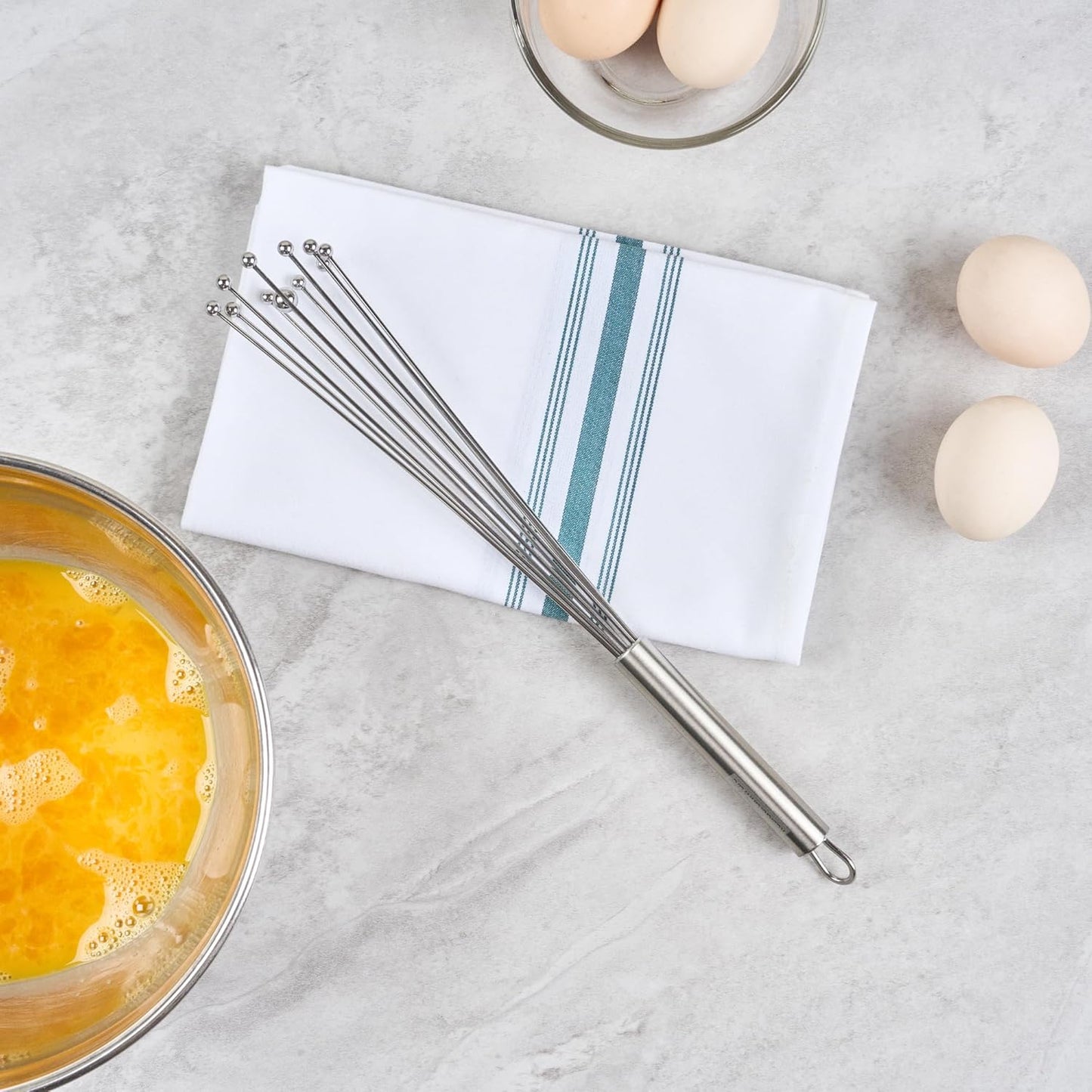 Restaurantware 10.5 in Stainless Steel Ball Whisk - German Standard Egg Beater with Ergonomic Handle, Dishwasher Safe - Manual Mixer Cooking Whisk for Baking, Stirring, Sauces, Beating