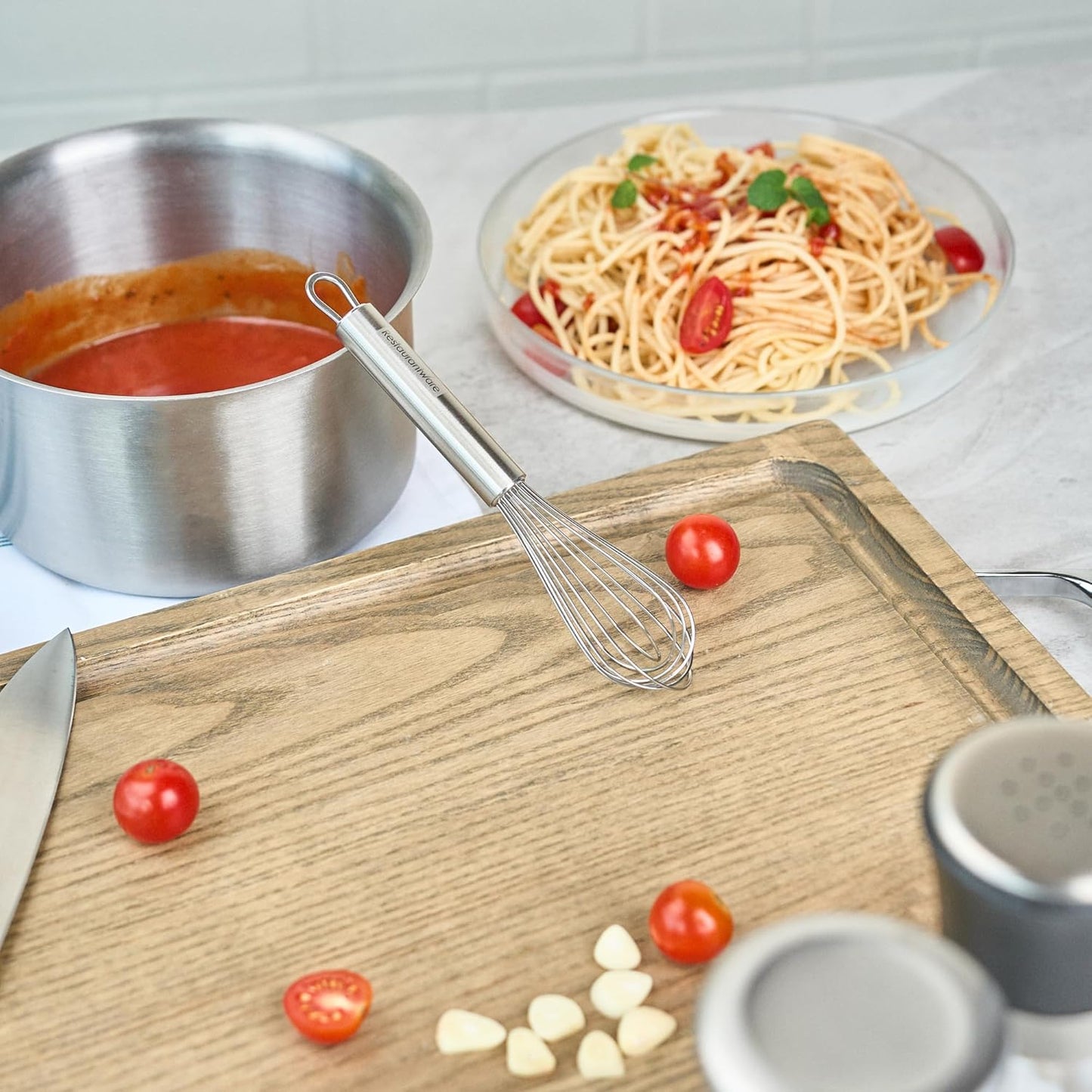 Restaurantware 10.5 in Stainless Steel Ball Whisk - German Standard Egg Beater with Ergonomic Handle, Dishwasher Safe - Manual Mixer Cooking Whisk for Baking, Stirring, Sauces, Beating