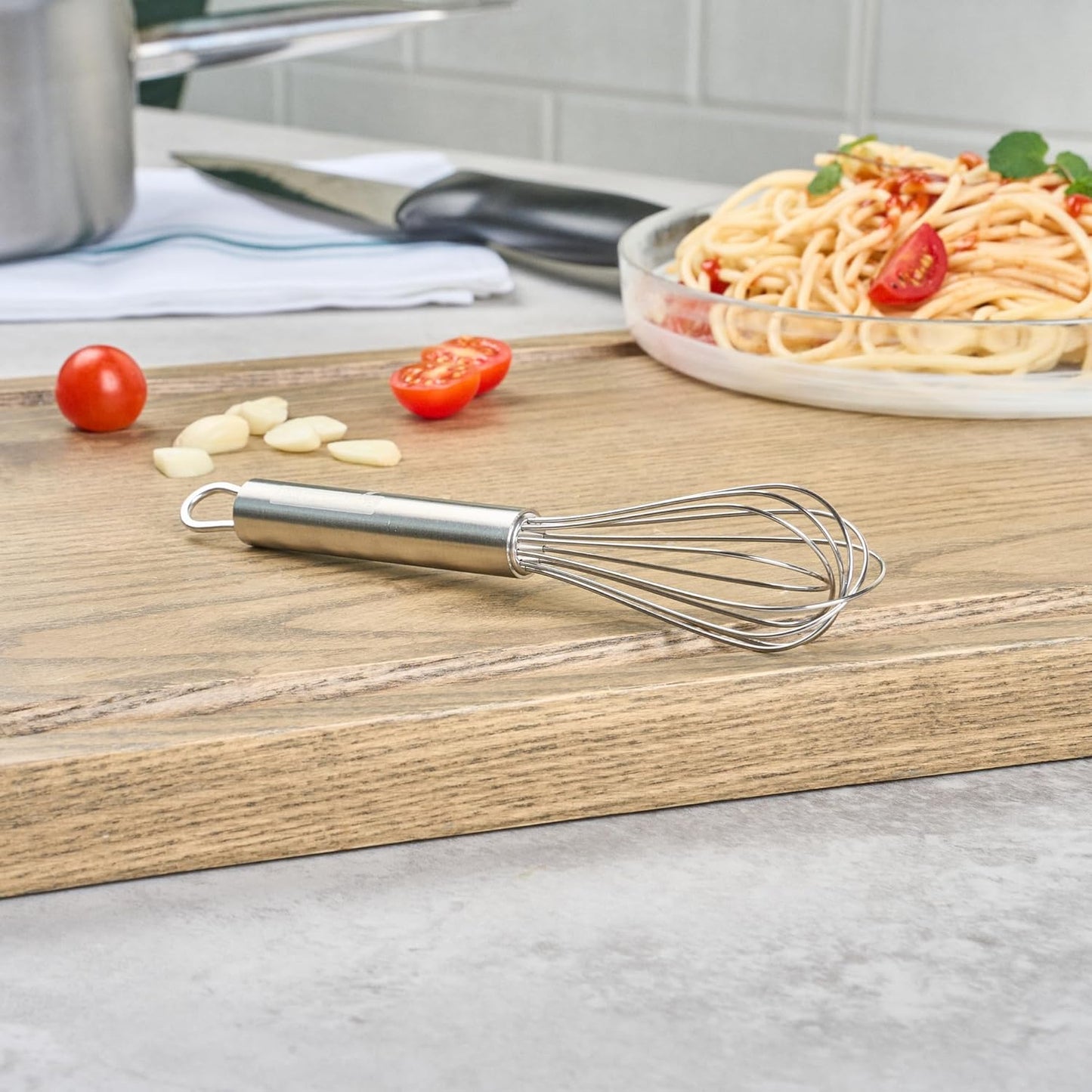 Restaurantware 10.5 in Stainless Steel Ball Whisk - German Standard Egg Beater with Ergonomic Handle, Dishwasher Safe - Manual Mixer Cooking Whisk for Baking, Stirring, Sauces, Beating