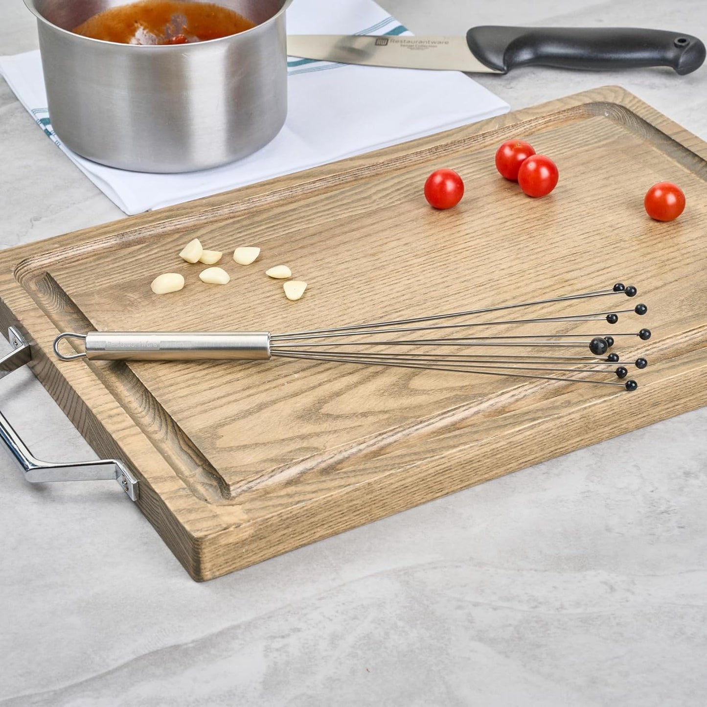 Restaurantware 10.5 in Stainless Steel Ball Whisk - German Standard Egg Beater with Ergonomic Handle, Dishwasher Safe - Manual Mixer Cooking Whisk for Baking, Stirring, Sauces, Beating