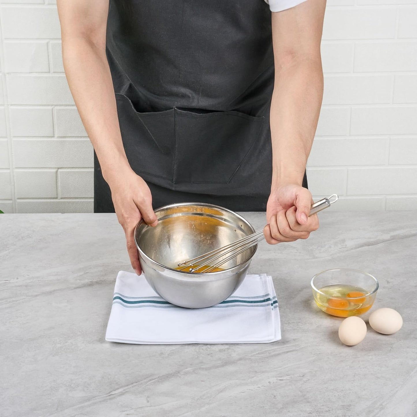 Restaurantware 10.5 in Stainless Steel Ball Whisk - German Standard Egg Beater with Ergonomic Handle, Dishwasher Safe - Manual Mixer Cooking Whisk for Baking, Stirring, Sauces, Beating
