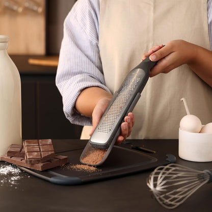 Zyliss Fine Grater and Zester - Handheld Grater with Stainless Steel Blade & Wheat Straw Handle - Ideal for Hard Cheese, Chocolate, Fruit, Vegetables, & More - Protective Cover Doubles as Scraper