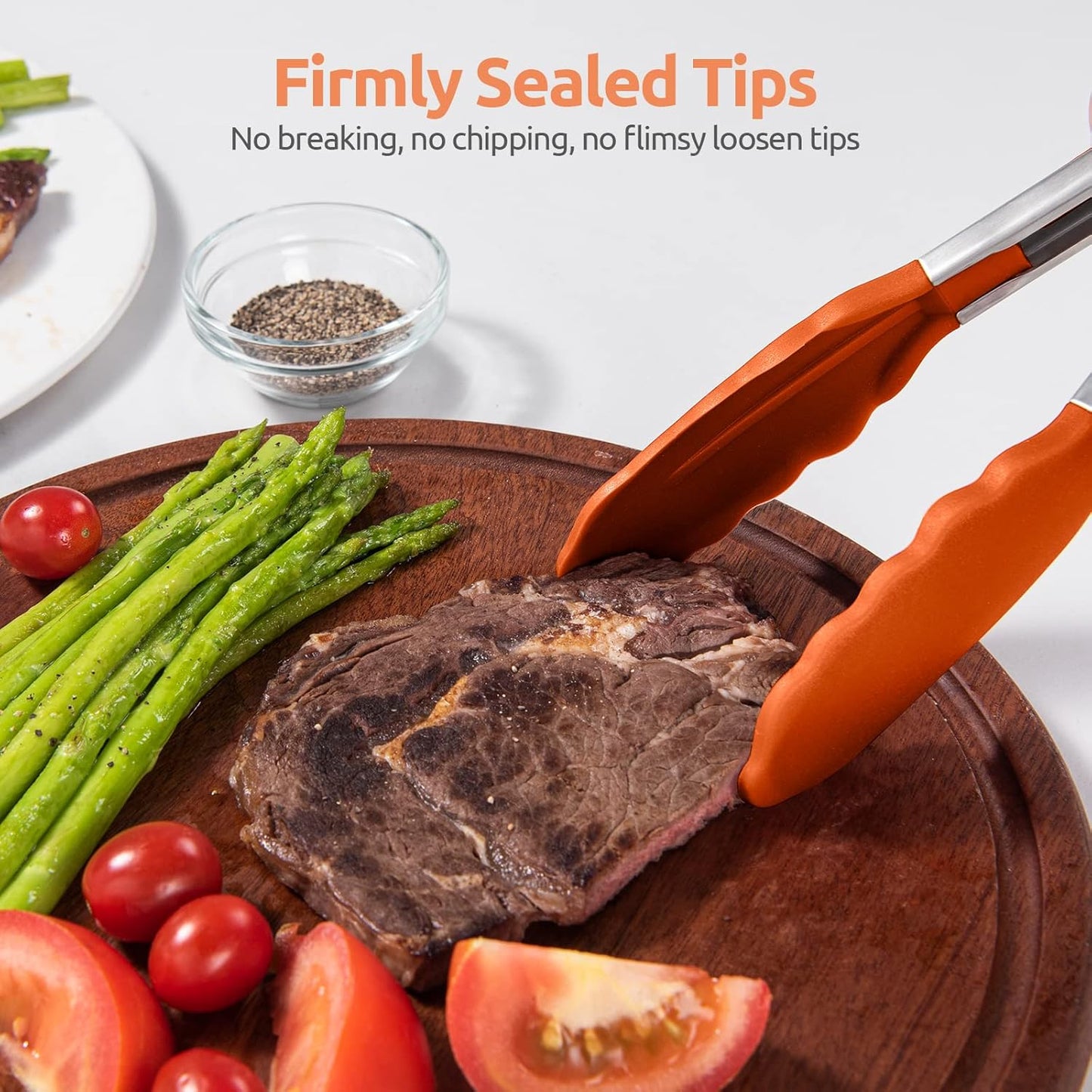 600ºF Heat Resistant Kitchen Tongs: U-Taste 9 inch Silicone Cooking Tong with Firm Sealed Non Stick Rubber Tips & Silicon Coated 18/8 Stainless Steel Handle & Smooth Locking for Serving Salad (Black)
