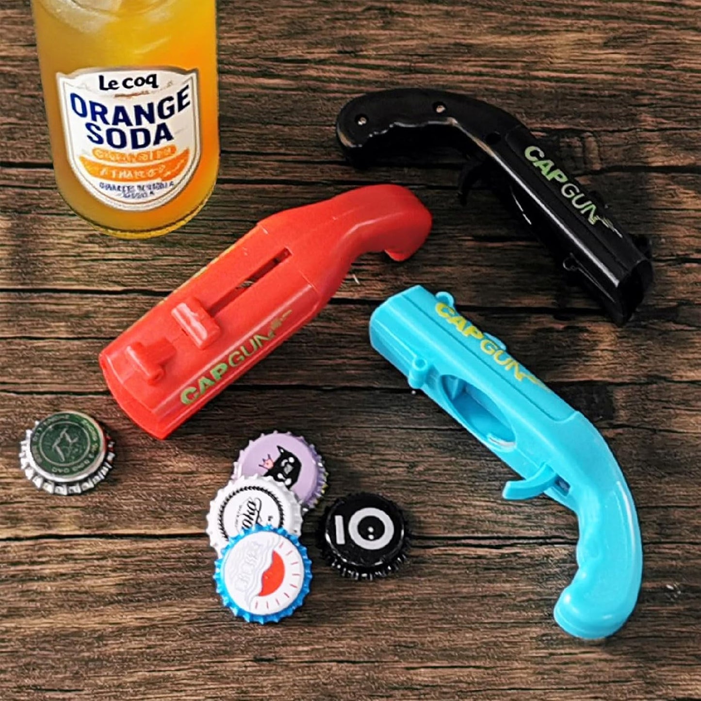 bottle cap shooting gun - Fun bottle opener tool launches bottle caps for parties, barbecues, and bar games (color)