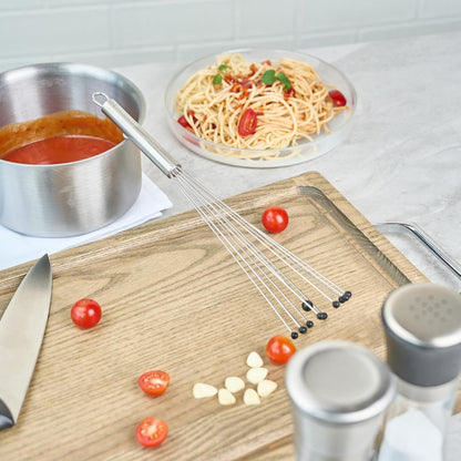 Restaurantware 10.5 in Stainless Steel Ball Whisk - German Standard Egg Beater with Ergonomic Handle, Dishwasher Safe - Manual Mixer Cooking Whisk for Baking, Stirring, Sauces, Beating
