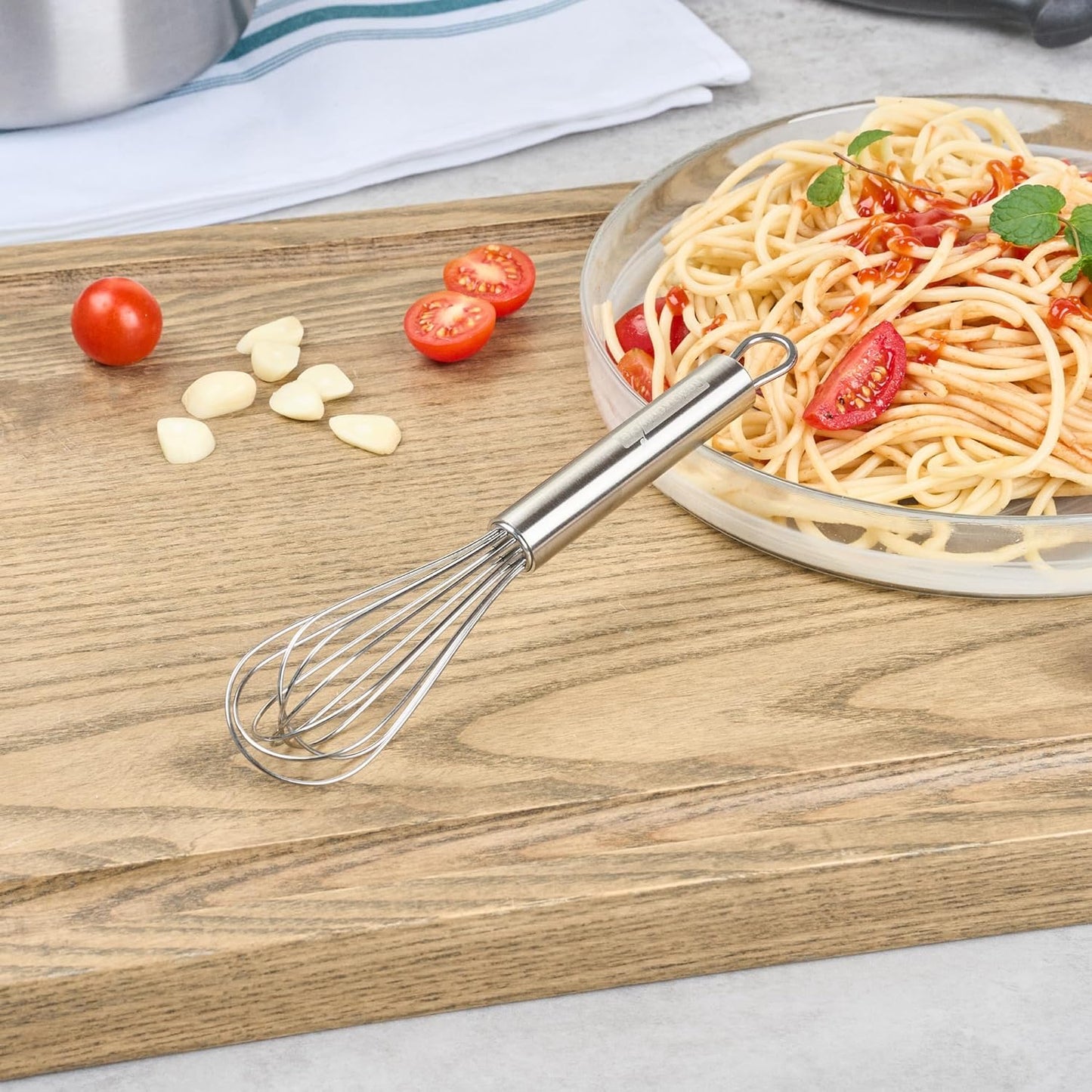 Restaurantware 10.5 in Stainless Steel Ball Whisk - German Standard Egg Beater with Ergonomic Handle, Dishwasher Safe - Manual Mixer Cooking Whisk for Baking, Stirring, Sauces, Beating