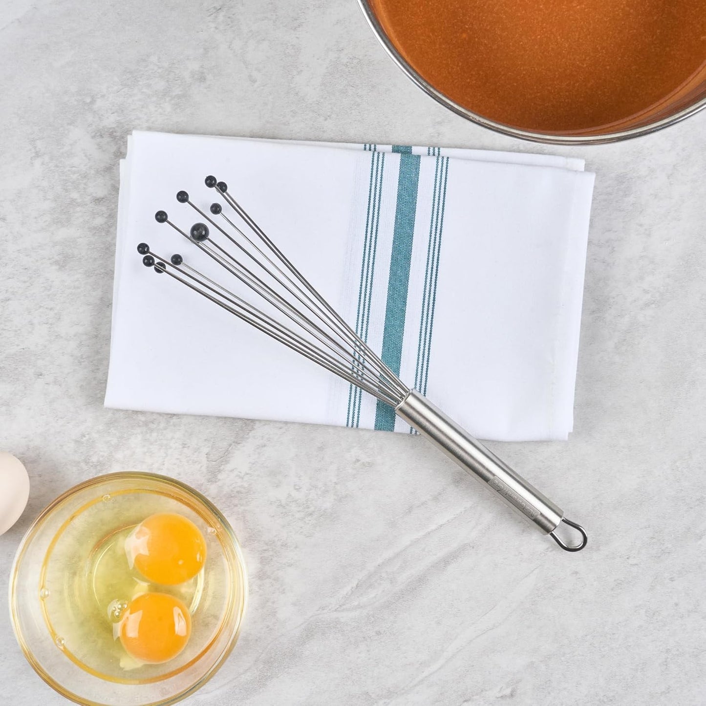 Restaurantware 10.5 in Stainless Steel Ball Whisk - German Standard Egg Beater with Ergonomic Handle, Dishwasher Safe - Manual Mixer Cooking Whisk for Baking, Stirring, Sauces, Beating
