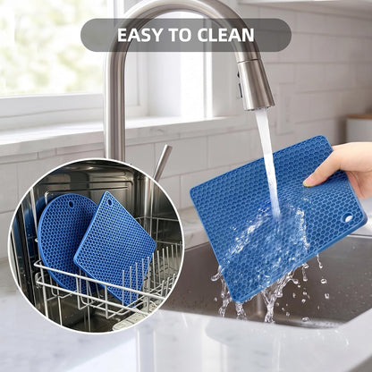 TWTLi Silicone Trivets for Hot Dishes, Set of 4 Trivet Mats, Heat Resistant Hot Pads for Kitchen Countertops, Non-Slip Honeycomb Pot Holders & Counter Protectors for Hot Pots & Pans (Black)