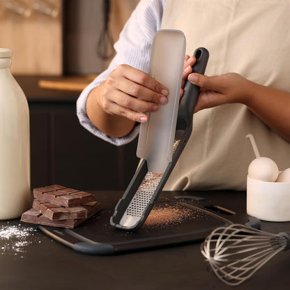 Zyliss Fine Grater and Zester - Handheld Grater with Stainless Steel Blade & Wheat Straw Handle - Ideal for Hard Cheese, Chocolate, Fruit, Vegetables, & More - Protective Cover Doubles as Scraper