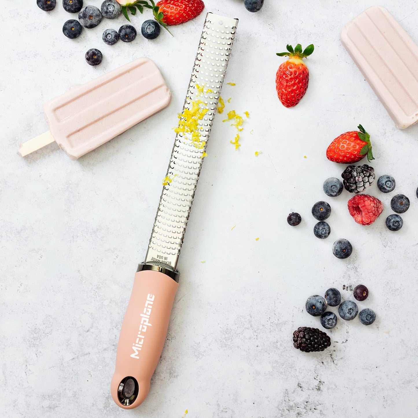 Premium Classic Series Zester - Pomegranate Red | Lemon Zester tool, Hard Cheese & Vegetable Grater | For Citrus, Parmesan Cheese, Garlic, Ginger, Nutmeg | Fine Stainless Steel Blade, Made in USA
