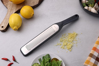 Zyliss Fine Grater and Zester - Handheld Grater with Stainless Steel Blade & Wheat Straw Handle - Ideal for Hard Cheese, Chocolate, Fruit, Vegetables, & More - Protective Cover Doubles as Scraper